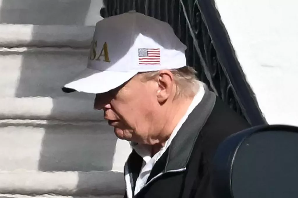 Trump keeps his head down and hides from cameras amid grave health rumors